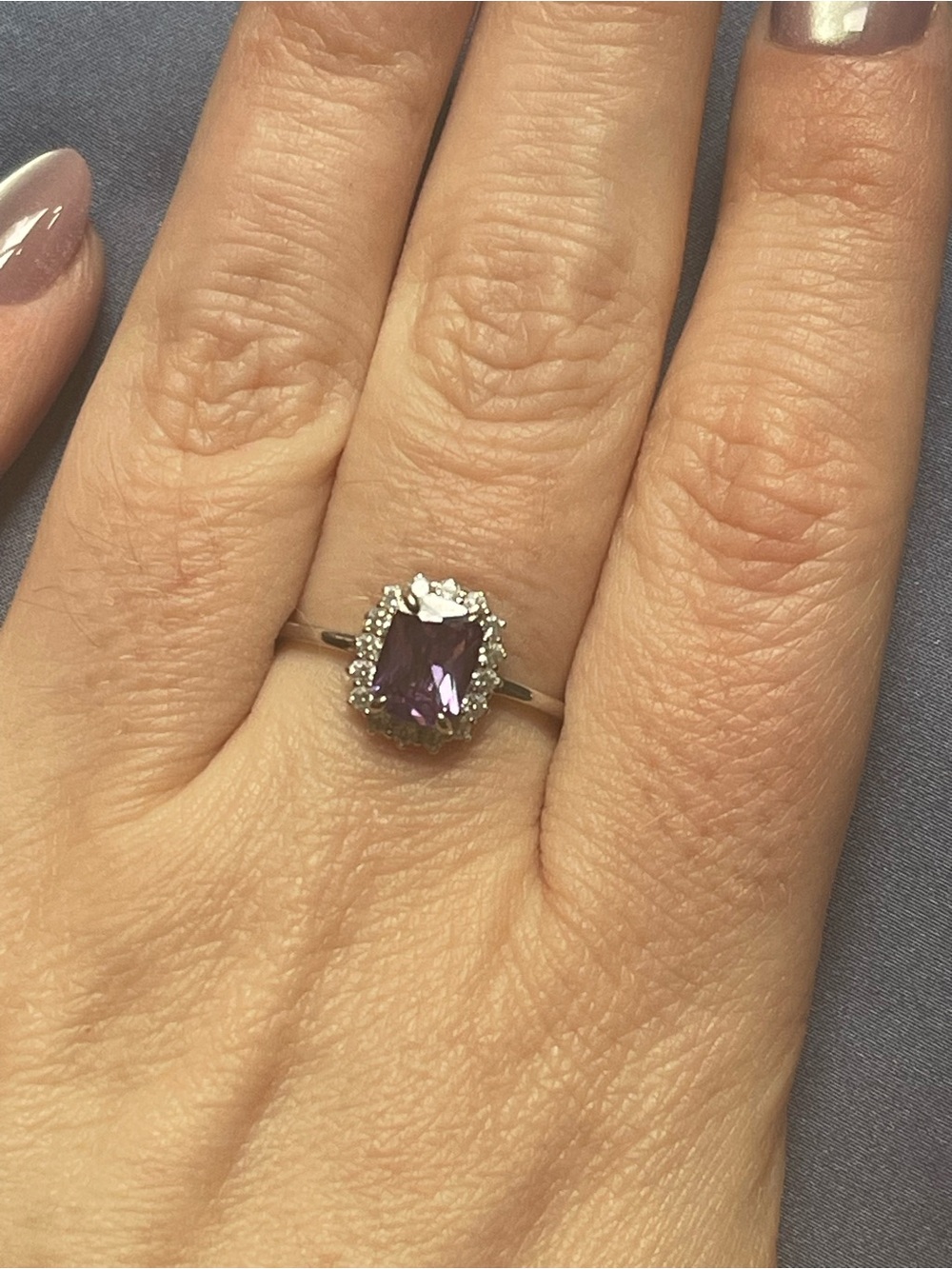 Silver Ring with Purple Gemstone and Halo Accent